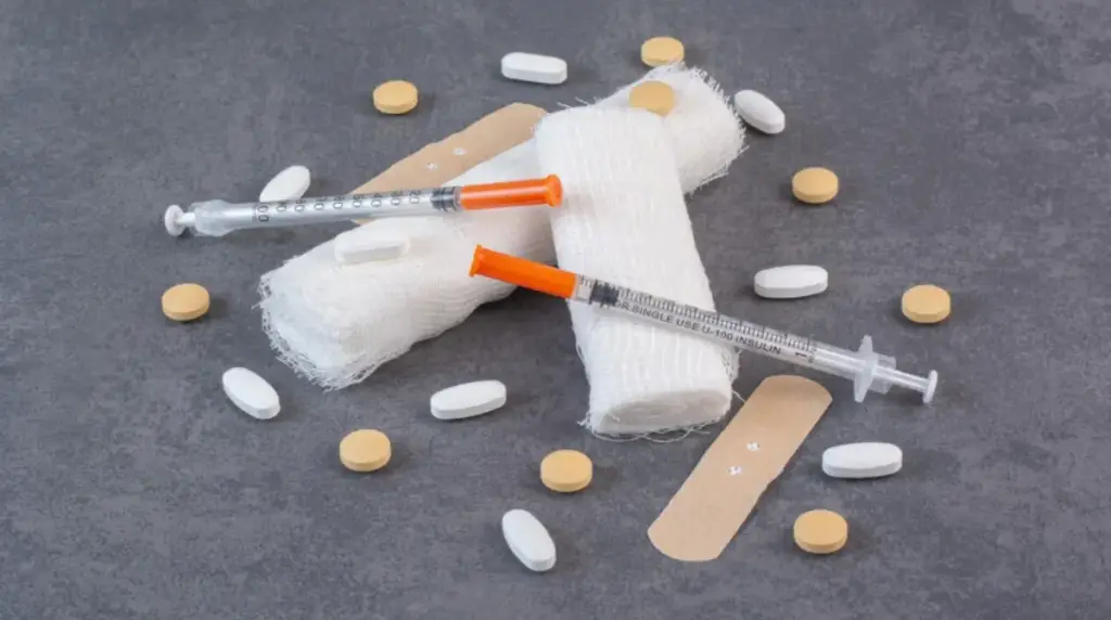 Syringes, medical bandages, and pills representing fentanyl addiction and injection drug use risks