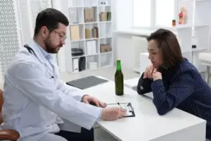 Doctor consulting with patient in office.
