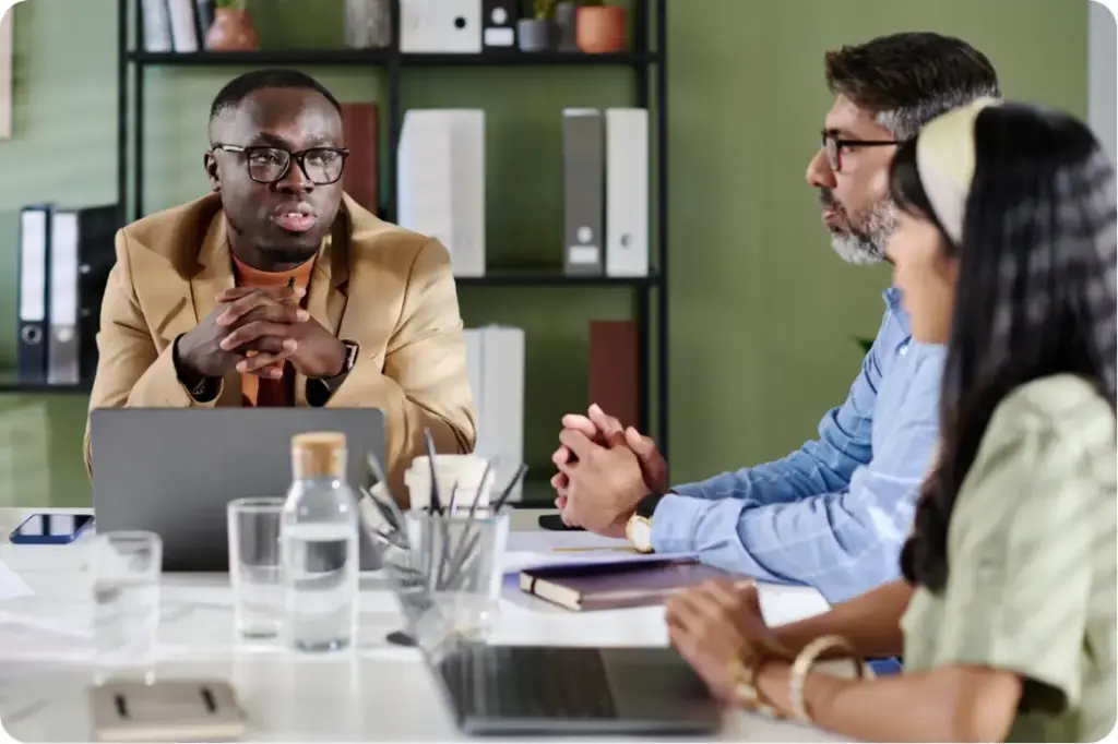Admissions specialist meeting with prospective clients in a private office to guide them through the rehab admissions process at Legacy Healing Center.