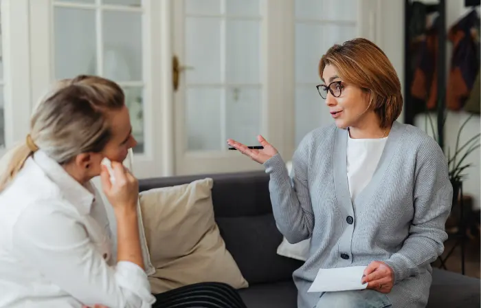 Therapist explaining evidence-based addiction recovery strategies during a counseling session